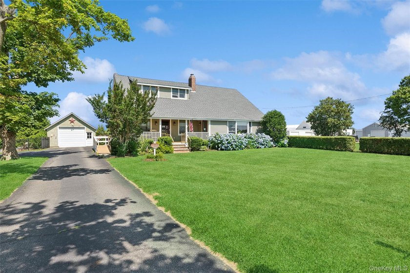 Nestled along picturesque Oregon Road, one of Cutchogue's most - photo 3