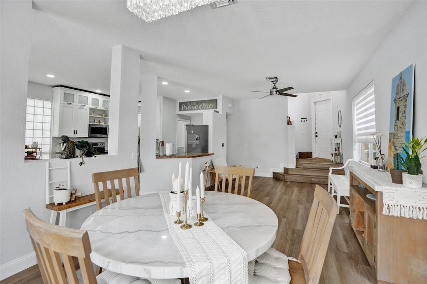 This beautifully updated 4BR/2.5BA waterfront home offers serene - photo 12