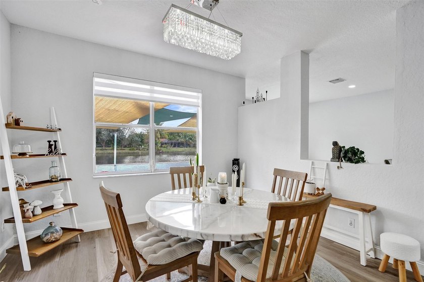 This beautifully updated 4BR/2.5BA waterfront home offers serene - photo 13
