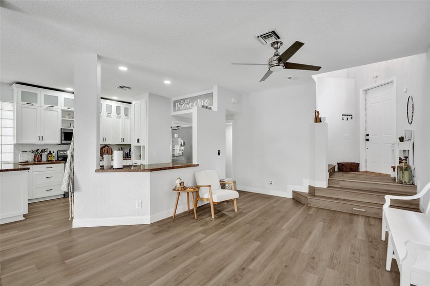 This beautifully updated 4BR/2.5BA waterfront home offers serene - photo 14