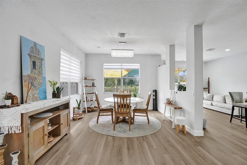 This beautifully updated 4BR/2.5BA waterfront home offers serene - photo 18