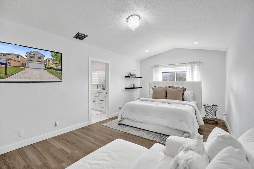 This beautifully updated 4BR/2.5BA waterfront home offers serene - photo 21