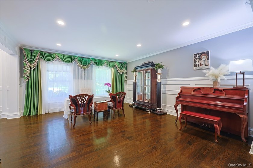 Located in the prestigious Village of Roslyn Harbor, this - photo 12