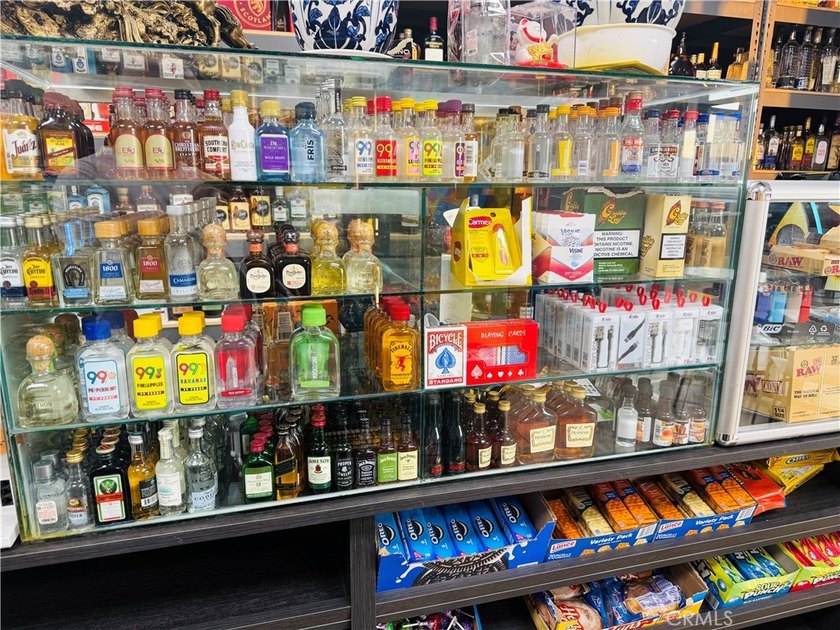PRICE IMPROVEMENT! RECENTLY UPDATED LIQUOR STORE, IN A VERY BUSY - photo 3