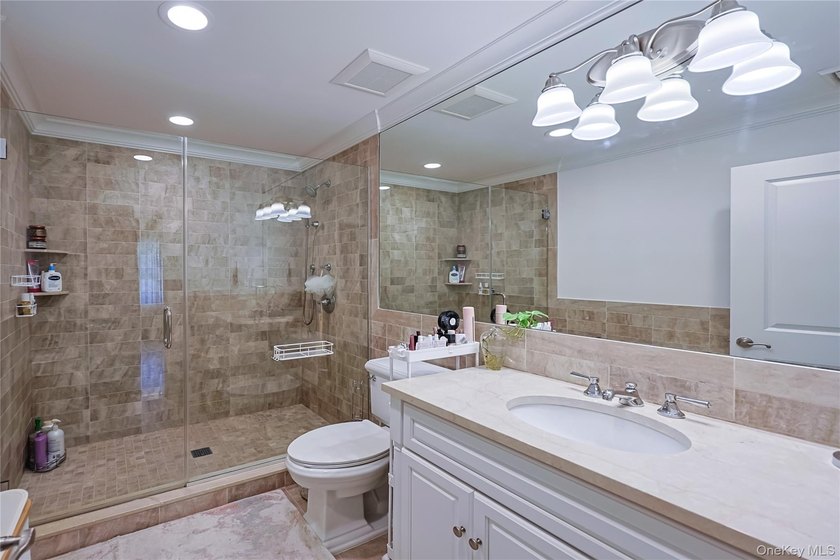 Located in the prestigious Village of Roslyn Harbor, this - photo 33