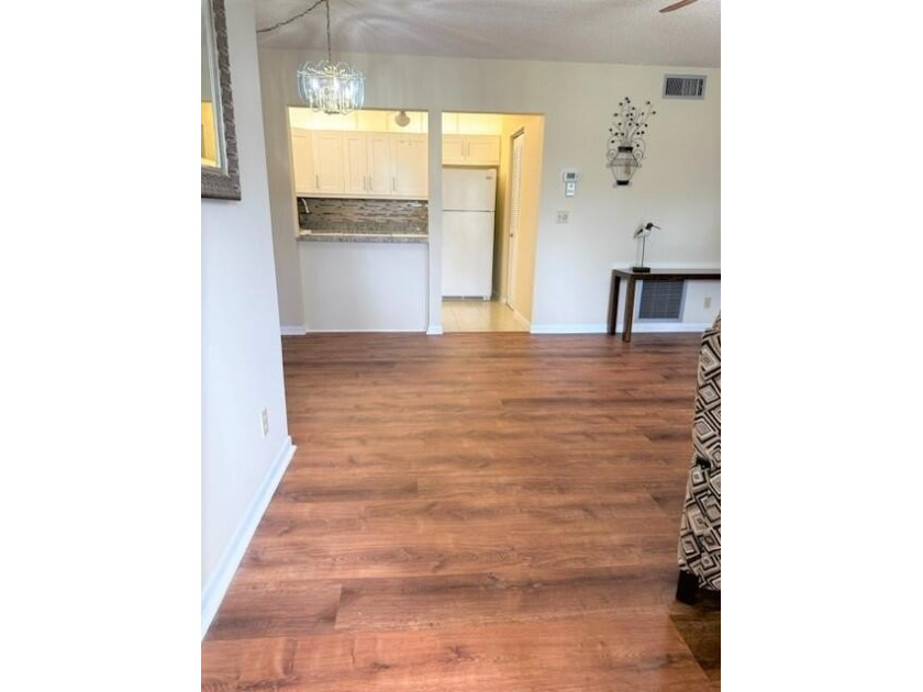 Welcome to this charming 55+ two-story condo located on the - photo 6