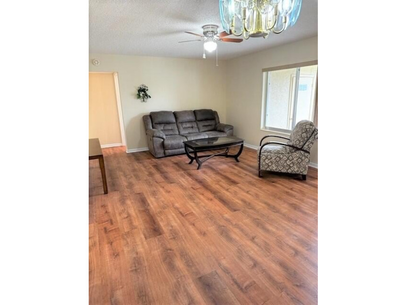 Welcome to this charming 55+ two-story condo located on the - photo 10