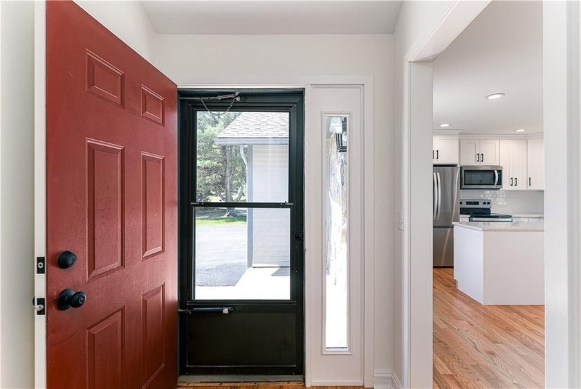 A rare find! Welcome to this sought-after one level end unit in - photo 5