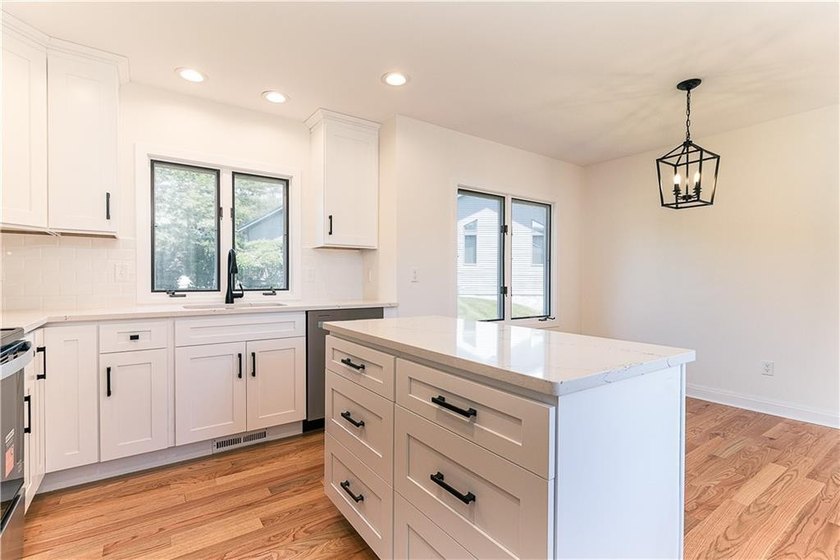 A rare find! Welcome to this sought-after one level end unit in - photo 7
