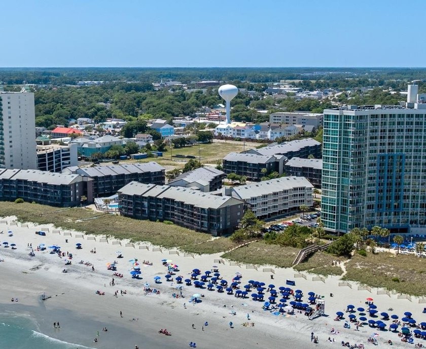 Experience coastal living at its finest in this beautifully - photo 2