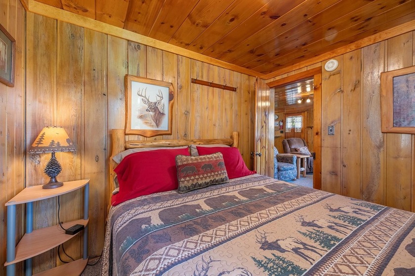 Situated on the crystal-clear shores of the stunning 1060-acre - photo 11