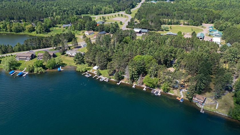 Situated on the crystal-clear shores of the stunning 1060-acre - photo 22