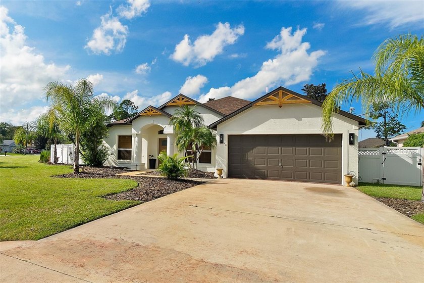 Set on an oversized lot that feels unusually expansive for - photo 2