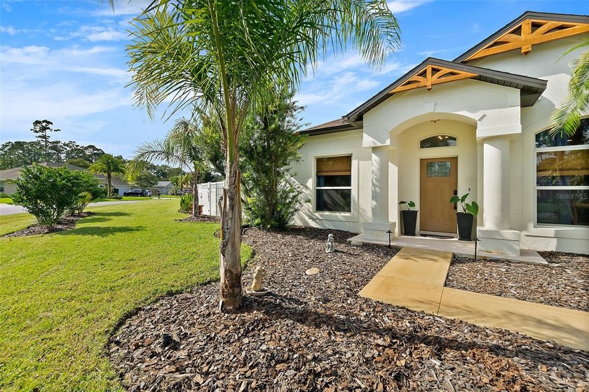 Set on an oversized lot that feels unusually expansive for - photo 3