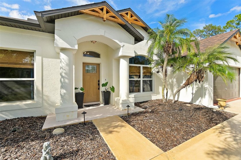 Set on an oversized lot that feels unusually expansive for - photo 4