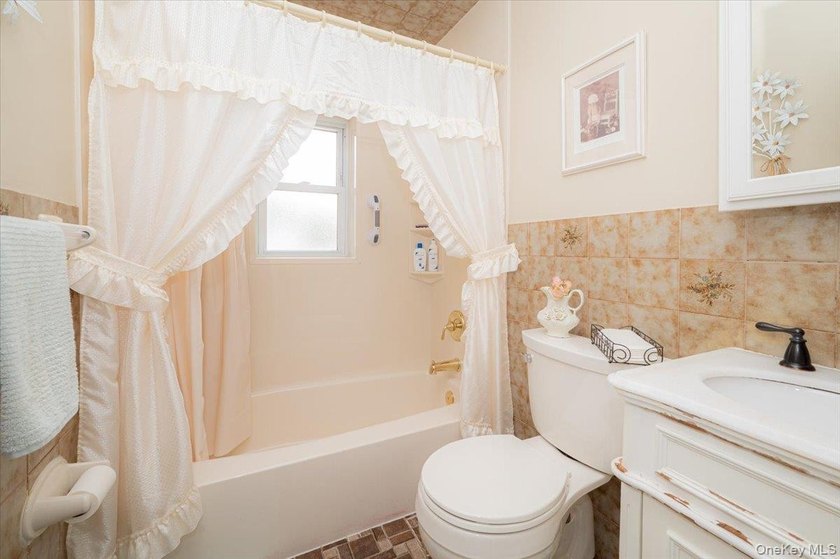 Welcome to 198-15 33rd Ave, a charming single-family home tucked - photo 22