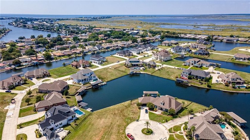Build your dream home on this prime waterfront lot in the - photo 12
