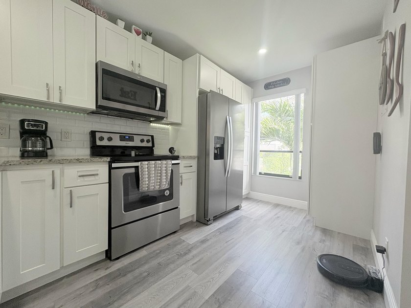 Welcome to this inviting 2-bedroom, 1.5-bath townhouse located - photo 32
