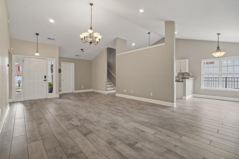 Welcome to 262 Palladium Drive, a beautifully maintained custom - photo 4