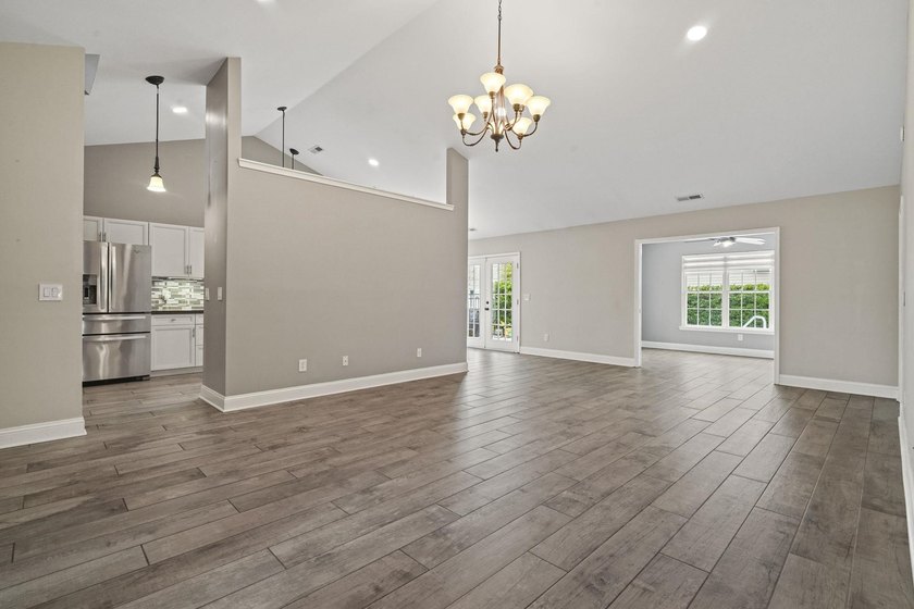 Welcome to 262 Palladium Drive, a beautifully maintained custom - photo 6