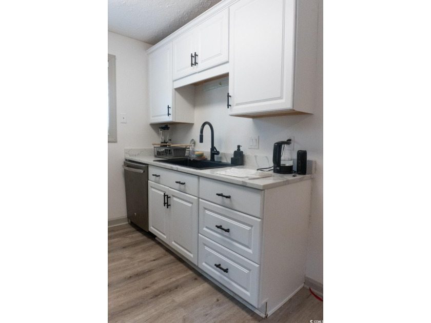 Welcome to SHOREWOOD! This beautifully updated condo, nestled on - photo 7