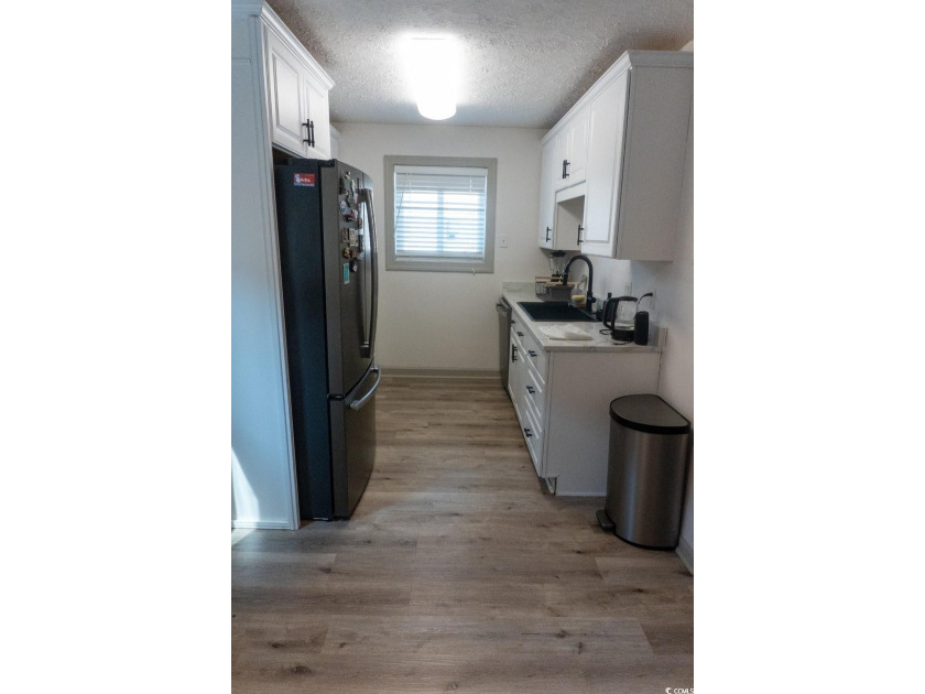 Welcome to SHOREWOOD! This beautifully updated condo, nestled on - photo 8