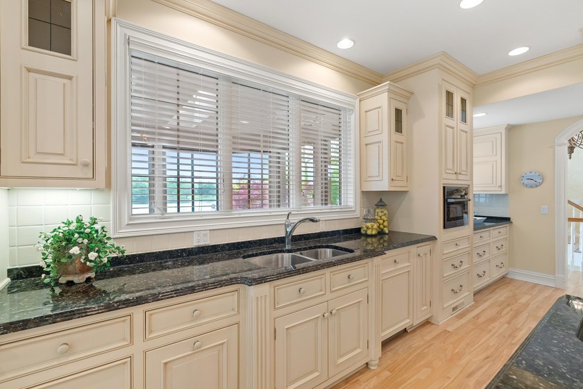 A Lakefront Legacy Estate - 225' Private Shoreline | 1.9 Acres | - photo 13