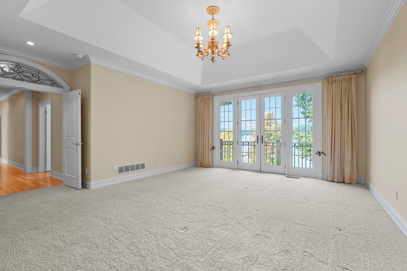 A Lakefront Legacy Estate - 225' Private Shoreline | 1.9 Acres | - photo 20