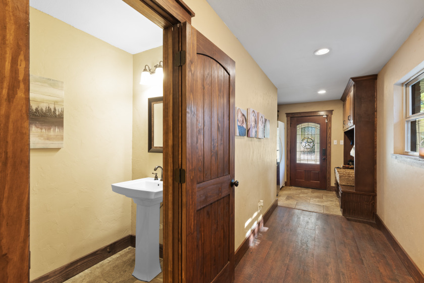 carport entry with storage and powder bath - photo 20