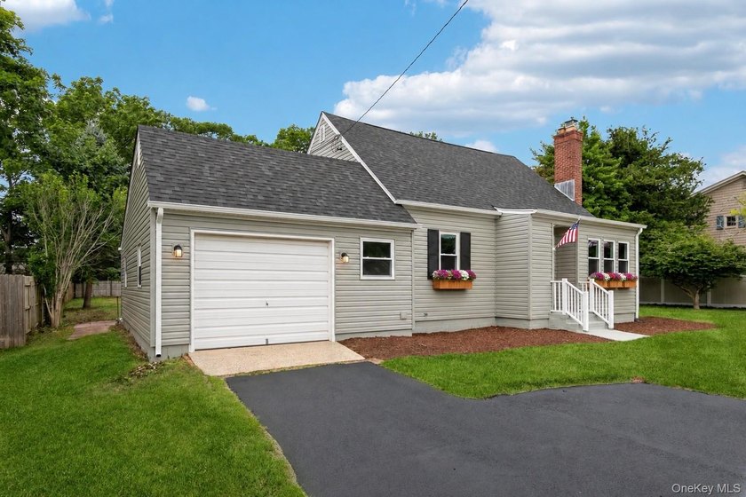 Welcome home to this beautifully renovated 4 bedroom, 2 full - photo 3