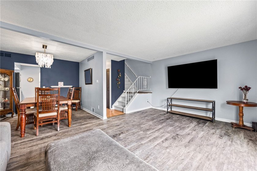 Brighton welcomes you home to this beautifully updated end-unit - photo 12