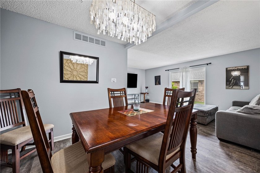 Brighton welcomes you home to this beautifully updated end-unit - photo 13