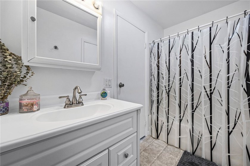 Brighton welcomes you home to this beautifully updated end-unit - photo 23