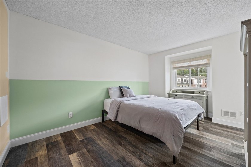 Brighton welcomes you home to this beautifully updated end-unit - photo 29