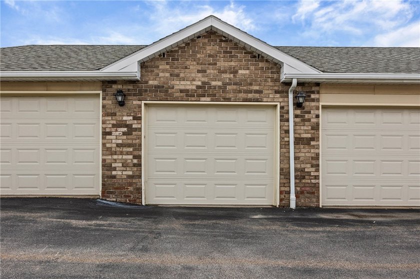 Brighton welcomes you home to this beautifully updated end-unit - photo 42