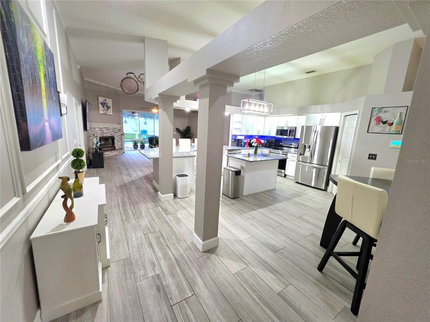 Welcome to this beautifully maintained pool home situated on an - photo 8