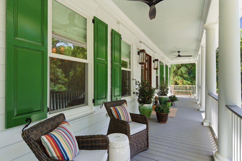 This elevated waterfront home with a private dock has been - photo 5