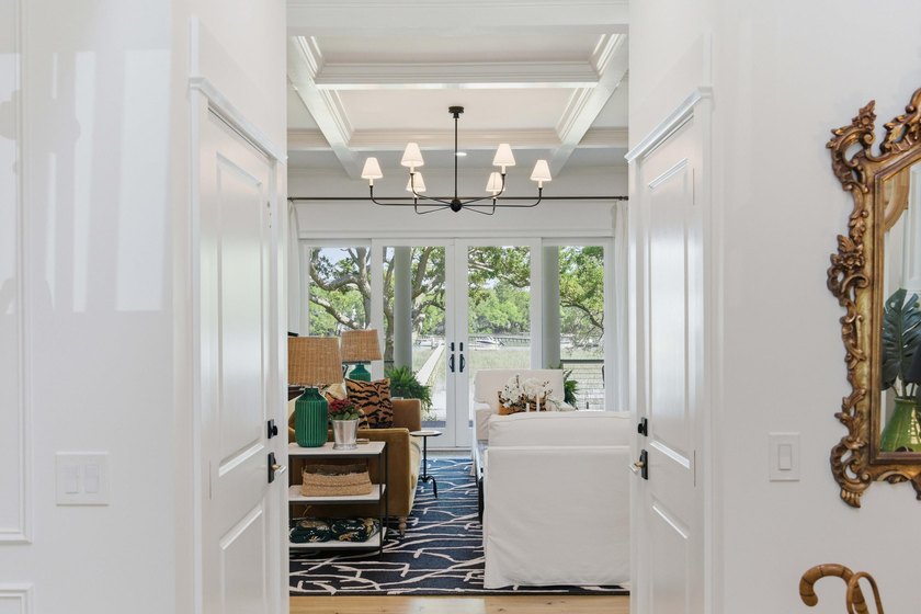 This elevated waterfront home with a private dock has been - photo 9