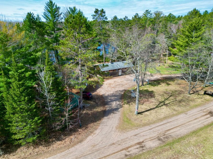 53 acres of mostly cleared land on pristine Croker Lake. The - photo 4