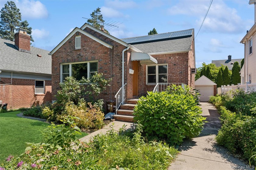 Charming All-Brick Bayside Detached Home with Endless Potential - photo 2