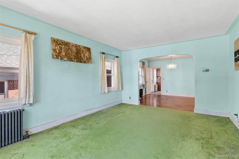 Charming All-Brick Bayside Detached Home with Endless Potential - photo 6