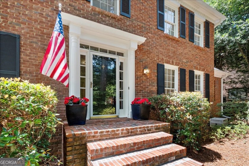 Traditional brick home on a lovely wooded lot near the best of - photo 11