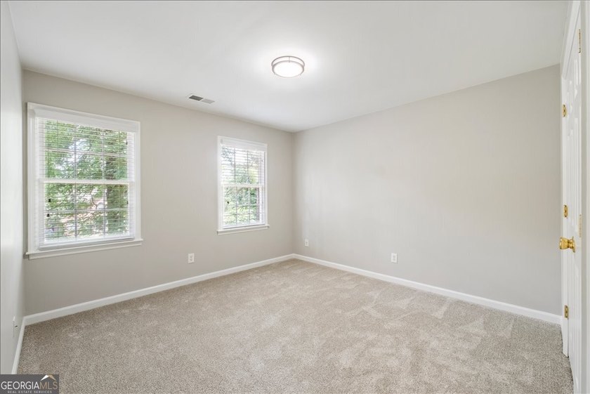 Traditional brick home on a lovely wooded lot near the best of - photo 44