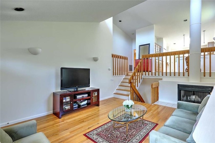 This well-maintained townhouse-style condominium is located in - photo 5