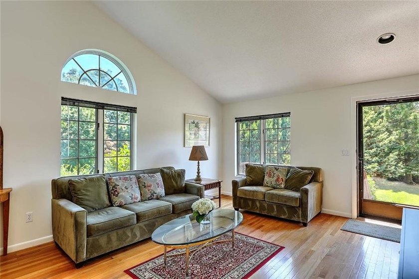 This well-maintained townhouse-style condominium is located in - photo 7