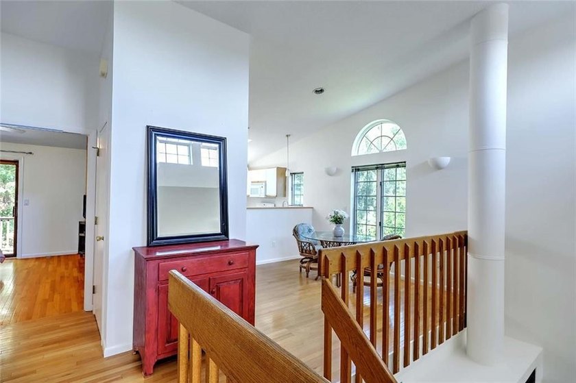 This well-maintained townhouse-style condominium is located in - photo 9