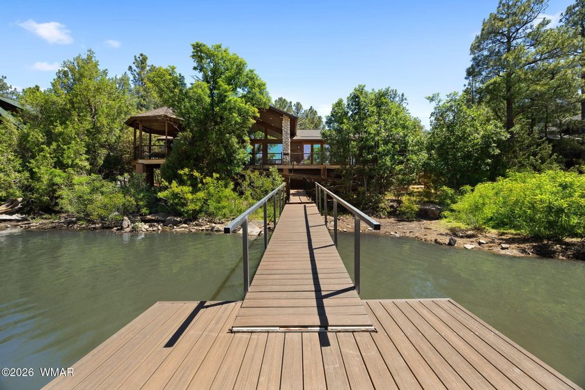 Wake up to breathtaking furnished waterfront views from this - photo 35