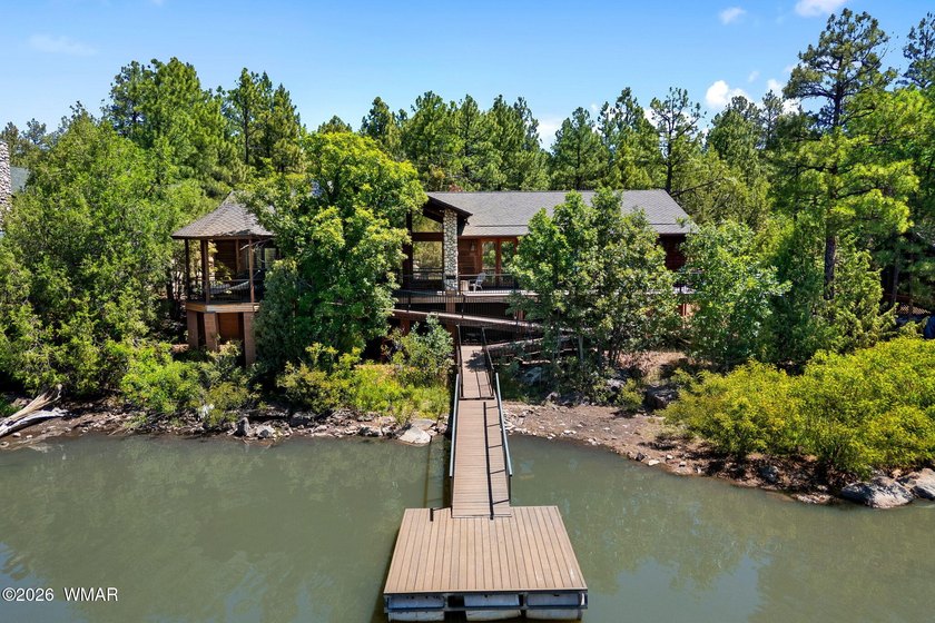Wake up to breathtaking furnished waterfront views from this - photo 36
