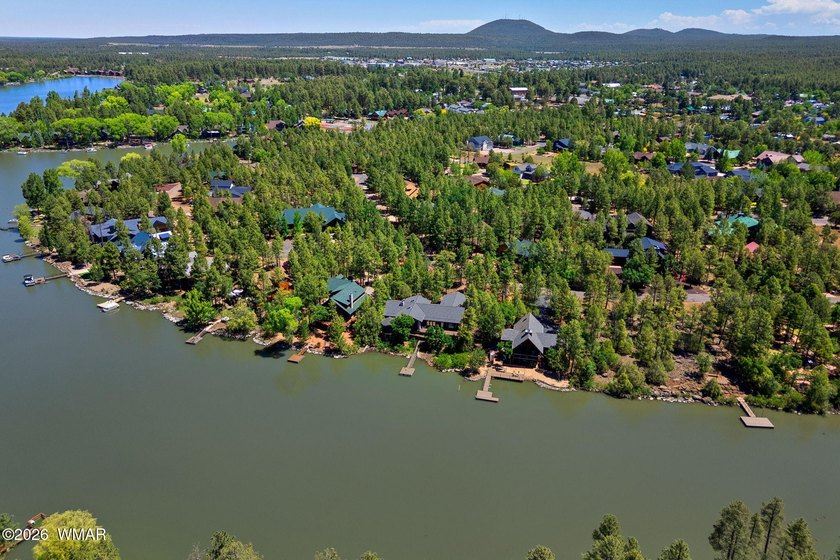 Wake up to breathtaking furnished waterfront views from this - photo 42