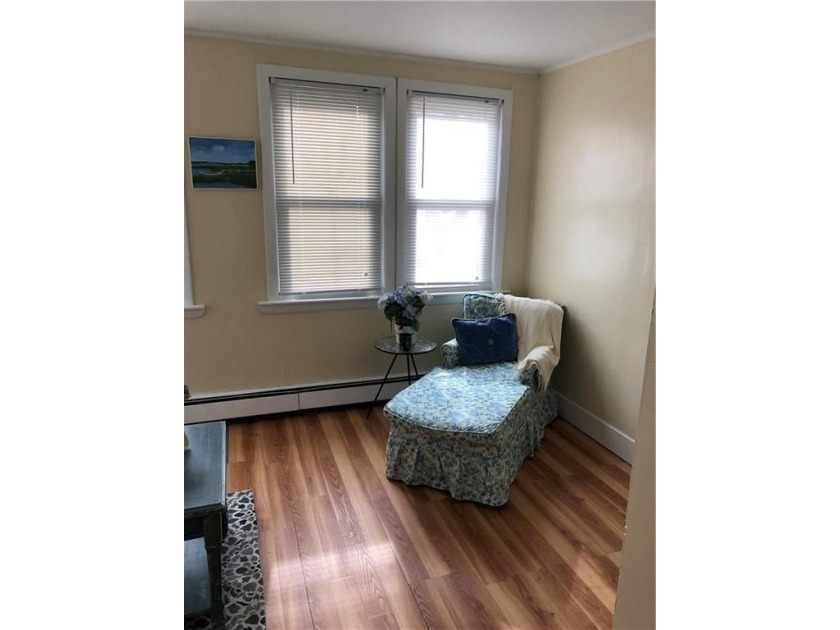 Welcome to this well-maintained 3 family home + 2 car garage - photo 4
